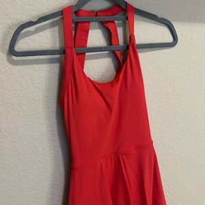 Red sporty dress with shorts and pockets